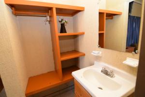 a bathroom with a sink and a mirror at San Felipe Rental Studio #1 Free WiFi and Cable TV in San Felipe