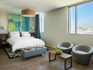 Ένα ή περισσότερα κρεβάτια σε δωμάτιο στο Adagio Jeddah City Center