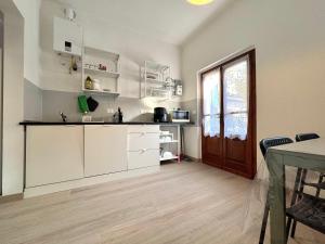 Kuchyň nebo kuchyňský kout v ubytování O&R Home Crema