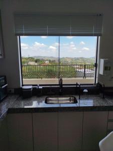 Kuchyň nebo kuchyňský kout v ubytování Serra Negra SP Quintas do Poente Casa 2