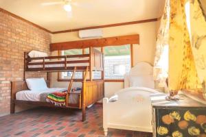 Ένα ή περισσότερα κρεβάτια σε δωμάτιο στο Rick`s beachfront house in San Felipe