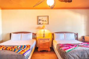 Ένα ή περισσότερα κρεβάτια σε δωμάτιο στο Rick`s beachfront house in San Felipe