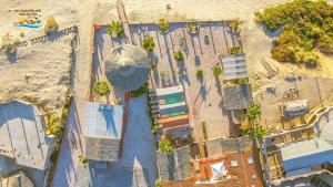 an overhead view of a beach with a pool at Rancho Percebu Beach Studio 6 in Don Pancho +6 photos