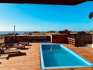 Bazén v ubytování Cabaña en chovellen nebo v jeho okolí