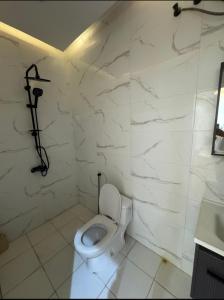 Koupelna v ubytování شقق ندى