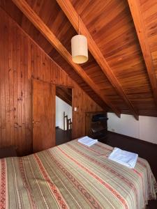 Ένα ή περισσότερα κρεβάτια σε δωμάτιο στο Finistterra