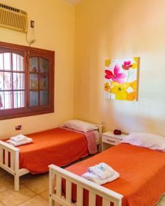 Postel nebo postele na pokoji v ubytování Mi pedacito de Cielo!!!!