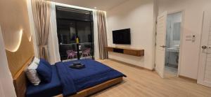 TV a/nebo společenská místnost v ubytování Goldena Residence Pool Villas