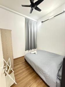 Ένα ή περισσότερα κρεβάτια σε δωμάτιο στο The Cove Ipoh 6 pax