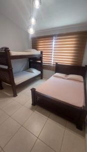 Postel nebo postele na pokoji v ubytování House Aura`s + 4 fotografie