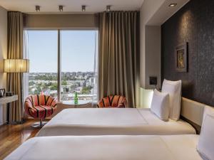 Postel nebo postele na pokoji v ubytování Swissotel Tallinn + 189 fotografií