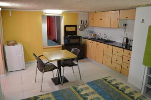 Kuchyň nebo kuchyňský kout v ubytování Miltos Apartment