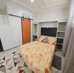 Ένα ή περισσότερα κρεβάτια σε δωμάτιο στο Tony's Place