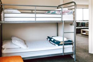 Ένα ή περισσότερα κρεβάτια σε δωμάτιο στο Relax @ 31 - Location Location!