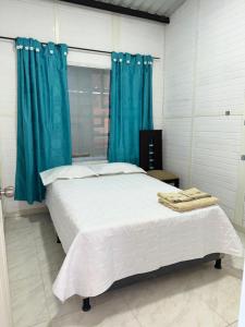 Postel nebo postele na pokoji v ubytování Casa Campestre San Geronimo