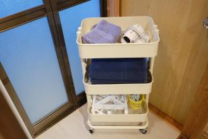 - une buanderie blanche avec des serviettes de toilette dans l'établissement Ichiya - Vacation STAY 83331, à Shimosato 28 autres photos