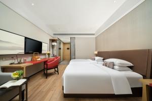 Φωτογραφία από το άλμπουμ του 南宁江南万达白沙大道怡程酒店 σε Νανίνγκ