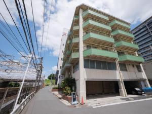 a tall building on the side of a street at Disney Style Hotel "J Hotel" - Vacation STAY 17216v in Chiba