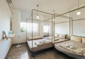 Postel nebo postele na pokoji v ubytování 5 homestay garden