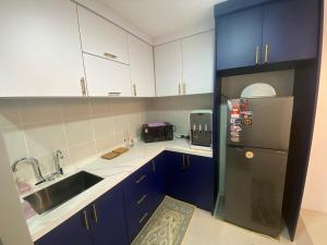 Kuchyň nebo kuchyňský kout v ubytování SKY MiMPi Kuala Terengganu Home