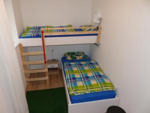 Llit o llits en una habitació de Ferienwohnung Lerchenweg