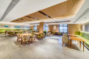 Χώρος καθιστικού στο Hanting Hotel Shanghai Fengxian Situan Baolong Plaza