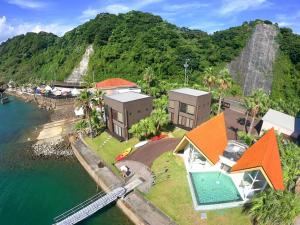 an aerial view of a house in the water at Kaamlanai Harbor - Vacation STAY 48810v in Nichinan