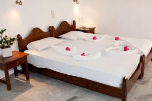 Postel nebo postele na pokoji v ubytování Anatoli Beach Hotel