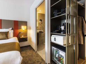 Postel nebo postele na pokoji v ubytování Mercure Belfort Centre + 91 fotografií