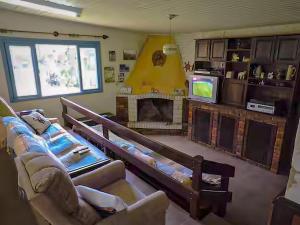 Μια τηλεόραση ή/και κέντρο ψυχαγωγίας στο Pousada Sítio Paremi