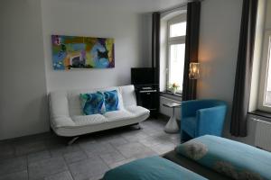 TV a/nebo společenská místnost v ubytování Hotel La Principessa