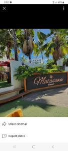 a picture of a hotel sign in front of a building at Matasawa Resort - Wailoaloa, Nadi in Nadi