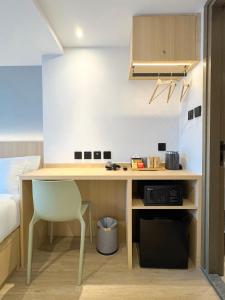 Η κουζίνα ή μικρή κουζίνα στο Bluejay Residences Kai Tak