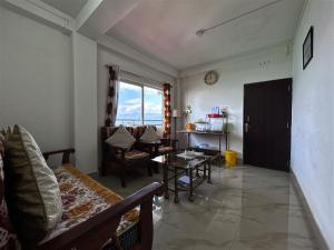 Posezení v ubytování Greenview + 2 fotografie