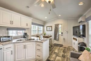 a kitchen with white cabinets and a sink at Clydesdale Cottage & Brandenburger Suite at Equestrian House PA in Pleasant Mount +18 photos