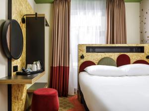 Postel nebo postele na pokoji v ubytování ibis Styles Bournemouth