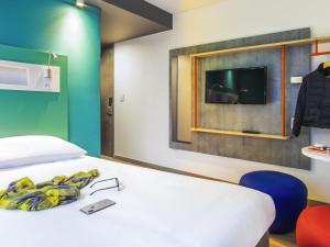 TV a/nebo společenská místnost v ubytování ibis budget Bogota Marly