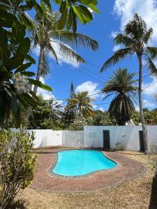 Swimmingpoolen hos eller tæt på Appartement Cocoon à Pereybere