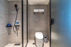 Ένα μπάνιο στο Hanting Hotel Shanghai Taopu New Village Subway Station +18 φωτογραφίες