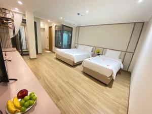 Ένα ή περισσότερα κρεβάτια σε δωμάτιο στο Dong Xuan Boutique Hotel