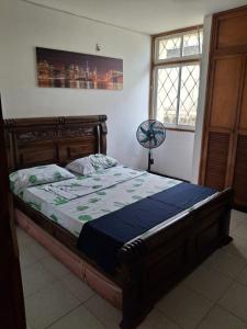 En eller flere senge i et værelse på BBB Apartamento en Edificio Mixto