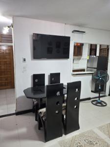 Et tv og/eller underholdning på BBB Apartamento en Edificio Mixto