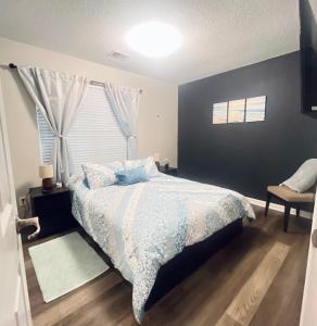 a bedroom with a bed and a window at Cozy-1bedroom suite near Downtown Lawrenceville in Lawrenceville