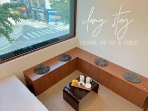 Ένα ή περισσότερα κρεβάτια σε δωμάτιο στο 이랑스테이 ILANG Stay +27 φωτογραφίες