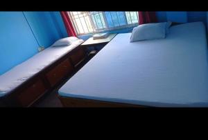 Postel nebo postele na pokoji v ubytování Shubh laxmi hotel Itahari