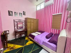 Postel nebo postele na pokoji v ubytování Homestay CikYam