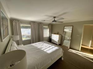 Ένα ή περισσότερα κρεβάτια σε δωμάτιο στο Dalyellup Family Holiday Home