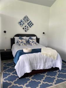 Giường trong phòng chung tại Suite Palm