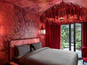 Postel nebo postele na pokoji v ubytování 25hours Hotel Florence Piazza San Paolino + 107 fotografií