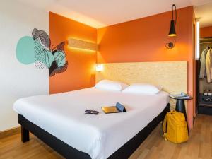 Ένα ή περισσότερα κρεβάτια σε δωμάτιο στο greet Brussels Airport Zaventem